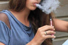 PAY-Young-girl-*******-an-electronic-*********.webp