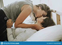 lesbian-couple-kissing-morning-lesbian-couple-kissing-morning-125322191.webp