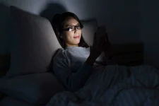 phone-in-bed.webp