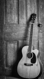 guitar-ad7b8960-7030-47f1-a05b-b1b021589356.webp