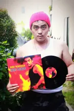 Rod Maceda holding his vinyl wearing white sando.webp Rod Maceda holding his vinyl wearing white sando.webp