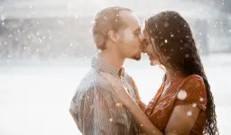 kissing-in-rain.webp