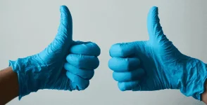 2-thumbs-up-gloves.webp