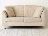 1-more-things-to-never-buy-garage-sale-05-couch-sl.webp