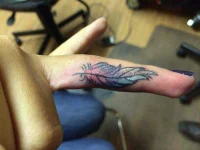 colored-inner-finger-tattoos.webp colored-inner-finger-tattoos.webp
