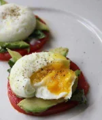 Poached-Eggs-with-Heirloom-Tomatoes-Avocado-.webp