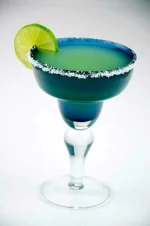 rita_with_lime_in_a_margarita_glass_-_Evan_Swigart.webp