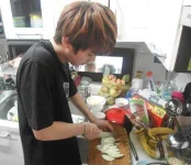 Jin BTS Cooking Onion.jpg