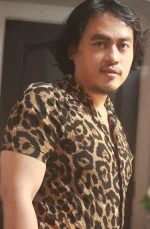 Rod Maceda sê×ÿ in brown smirk.webp